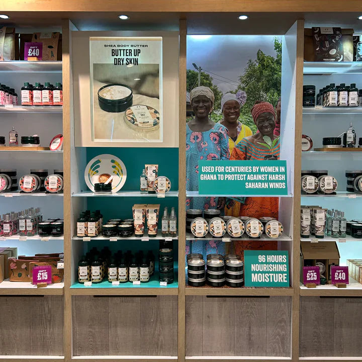 The Body Shop butikshylde med body butter produkter og kampagneplakater